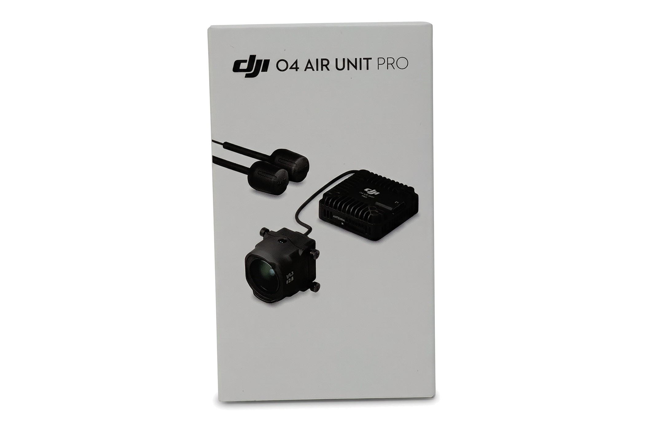 Originalverpackung des DJI O4 Air Unit Pro von vorne mit Abbildung von Kamera, Modul und Antennen